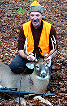 Photo of deer hunter and 8 point 180 pound buck shot in Vermont's Northeast Kingdom