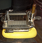 Antique butter cutter which can be found in Jackson's Cafe